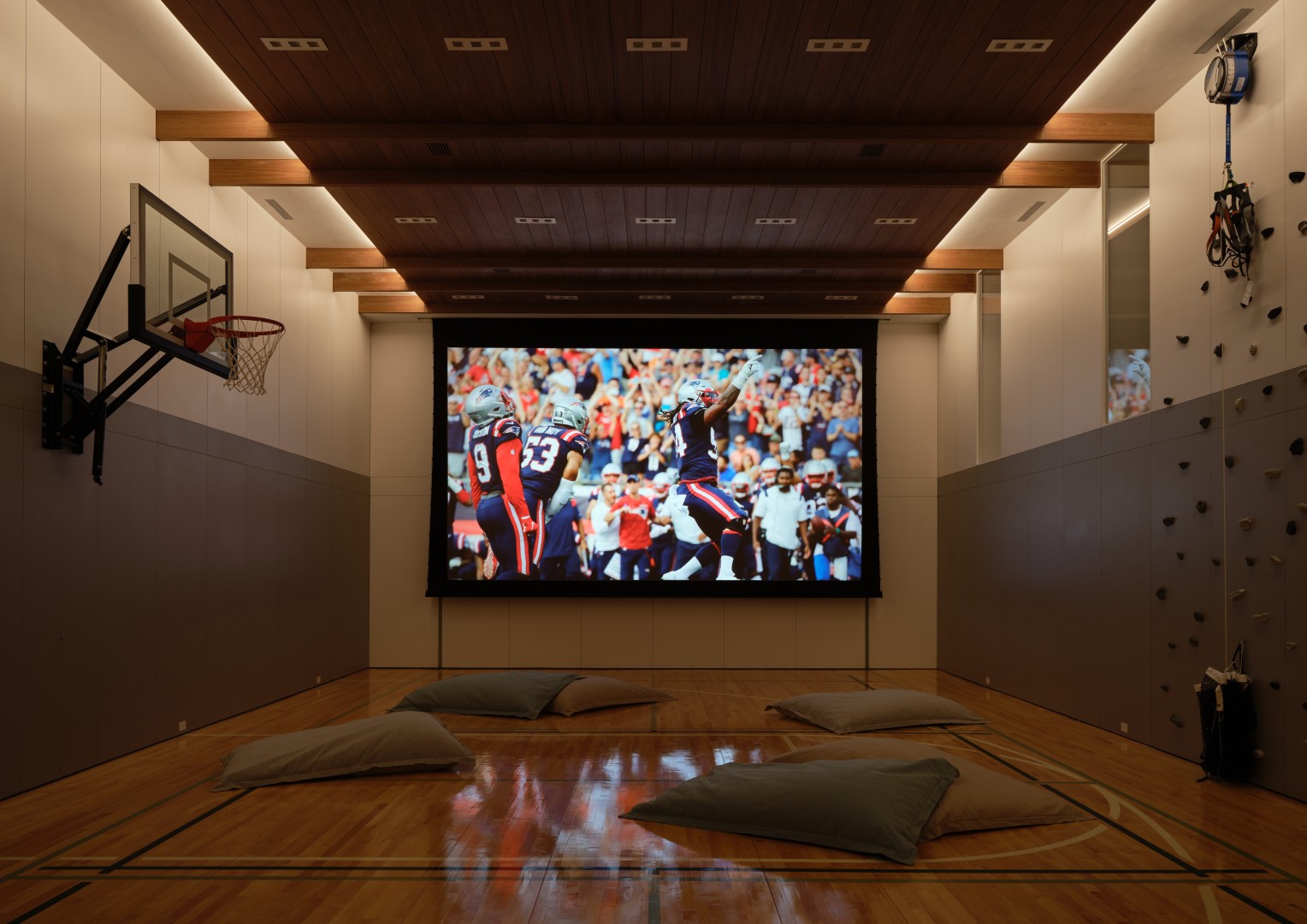 Luxury home theater with a large screen and concealed audio