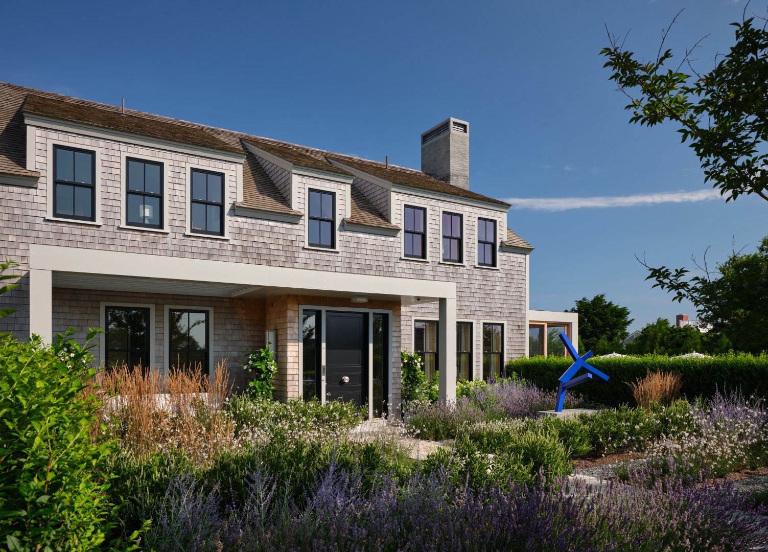 Exterior of a luxury estate — standardized technology across multiple properties